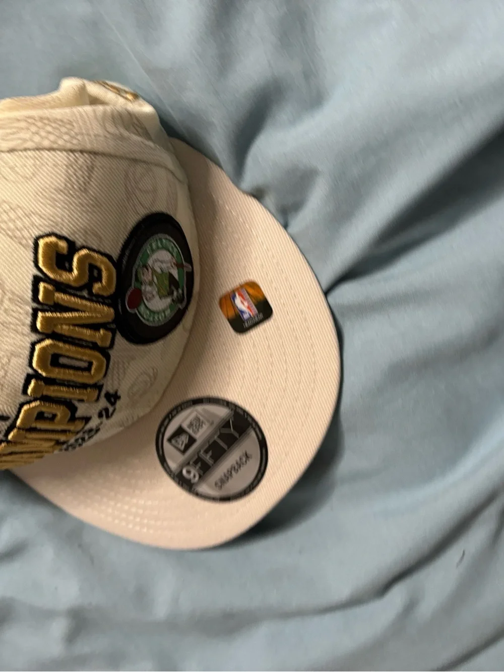 NBA Champions 2023-24 Beige Snapback Hat with Team Patch